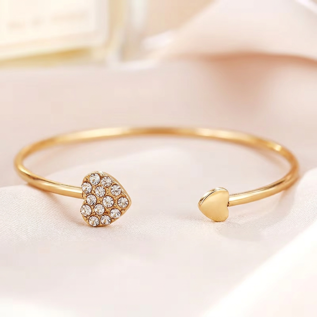 Close-up of the crystal and polished gold-tone hearts