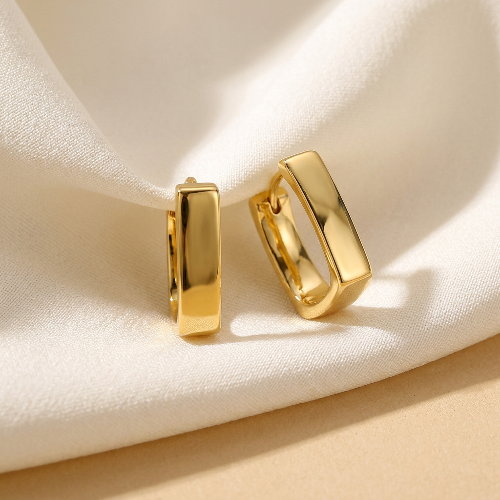 Gold earrings detail photograph