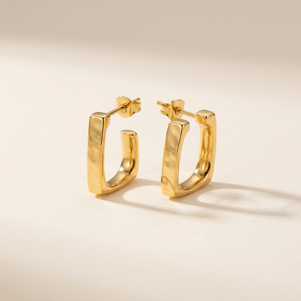 Gold earrings hero product photo