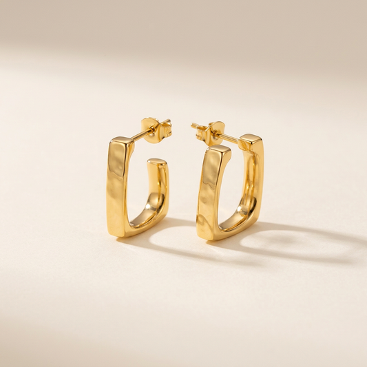 Gold earrings hero product photo