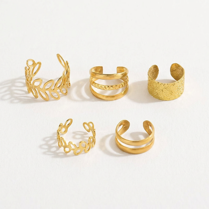 Gold-tone five-piece ear cuff set on white