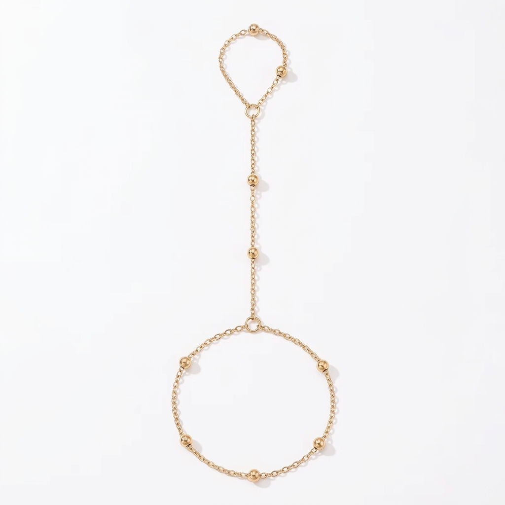 Gold-tone hand chain on a clean white background