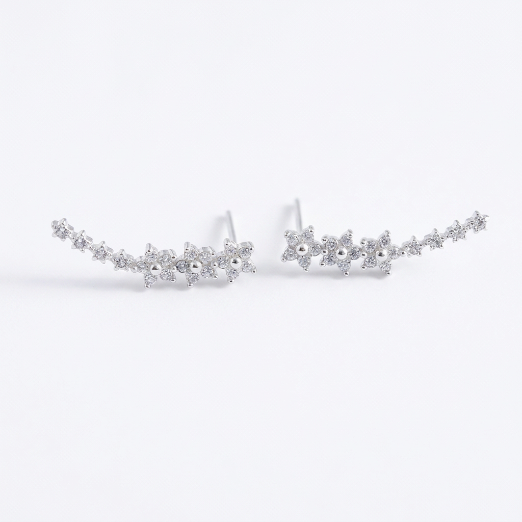 Silver-tone earrings on a clean white background